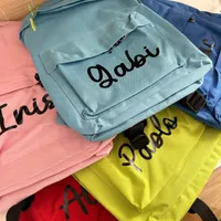 MOCHILA CON NOMBRE ROJA
