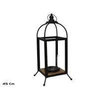 Farol decorativo de metal negro con base de madera y vaso de cristal para vela, medidas 21,5x21,5x45 cm.